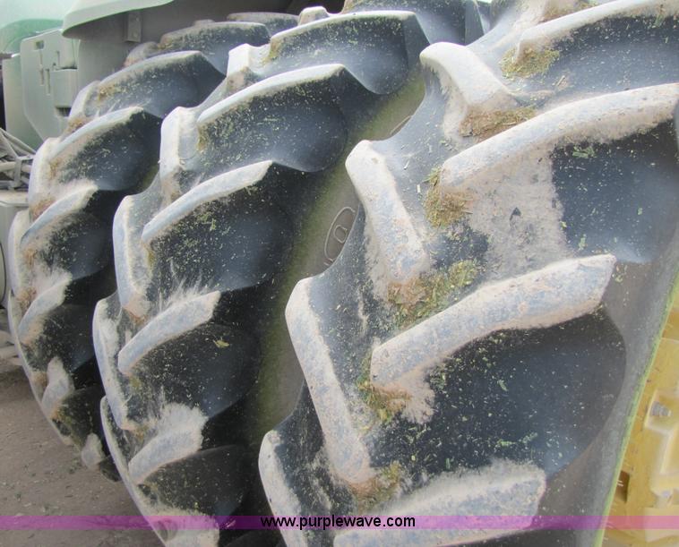 image for item 3145 2005 John Deere 9520 4WD tractor with Grouser two-way blade