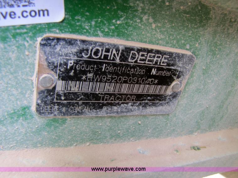 image for item 3145 2005 John Deere 9520 4WD tractor with Grouser two-way blade