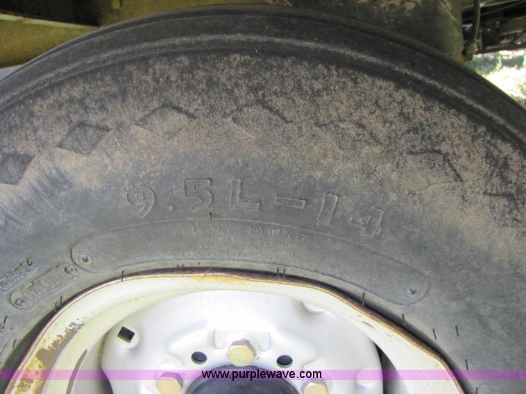 image for item 3147 2004 Challenger BA4 4x4 large square three-bale accumulator