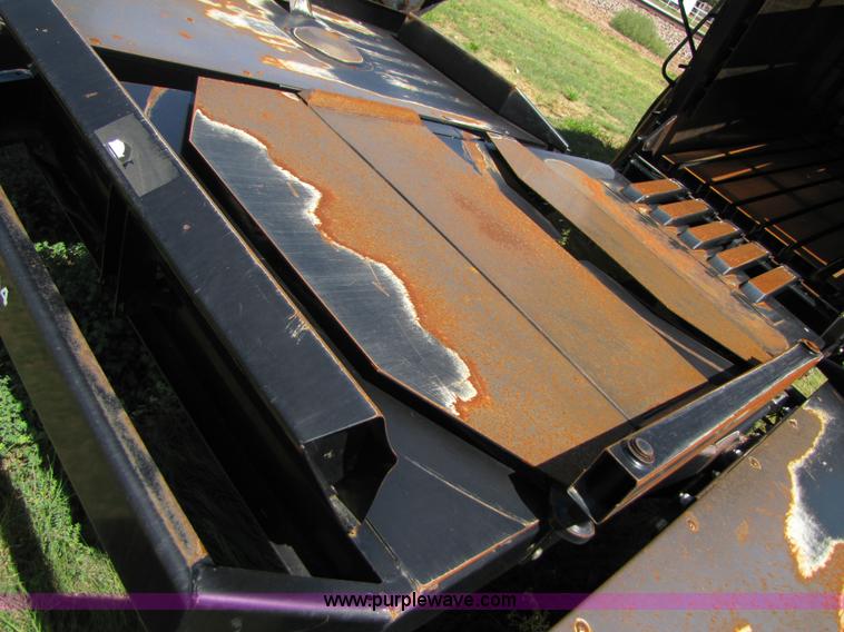 image for item 3147 2004 Challenger BA4 4x4 large square three-bale accumulator