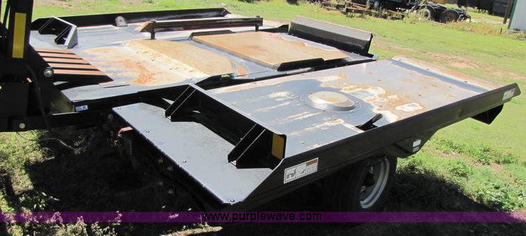 image for item 3147 2004 Challenger BA4 4x4 large square three-bale accumulator