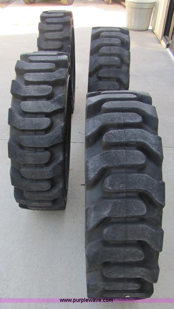 image for item 2324 (4) Bullman flatproof skid steer tires