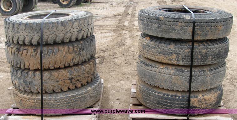 image for item 2552 (8) 9.00-20 rims and tires