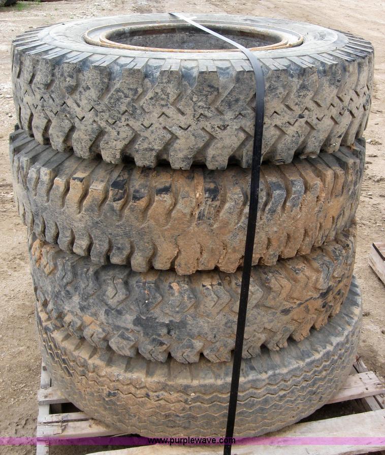 image for item 2552 (8) 9.00-20 rims and tires