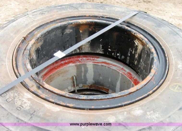 image for item 2552 (8) 9.00-20 rims and tires