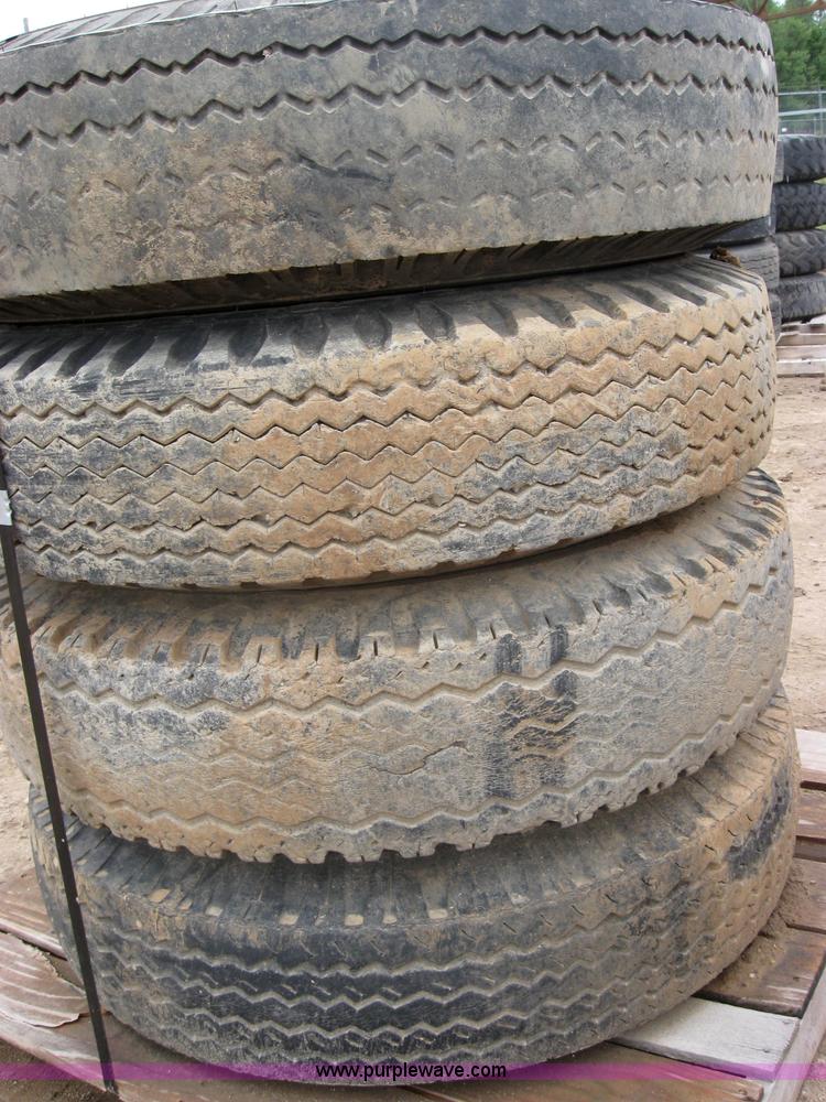 image for item 2552 (8) 9.00-20 rims and tires