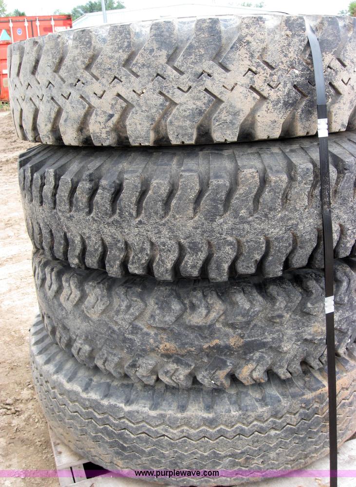 image for item 2552 (8) 9.00-20 rims and tires