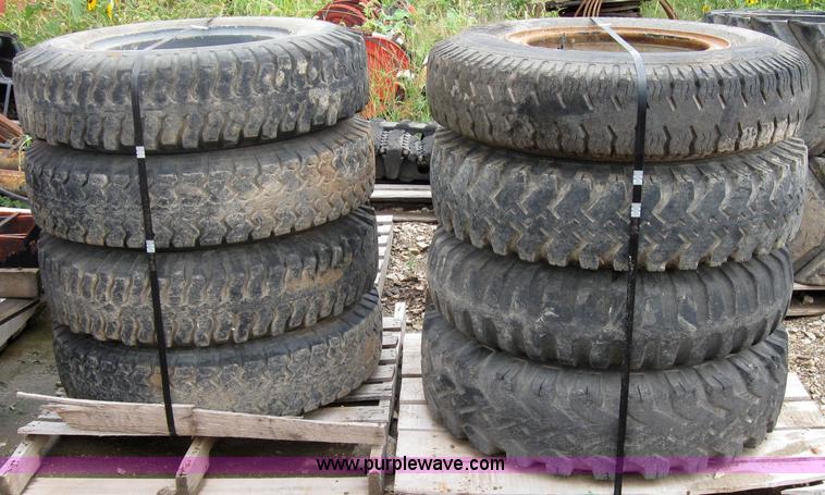 image for item 2553 (8) 9.00-20 rims and tires
