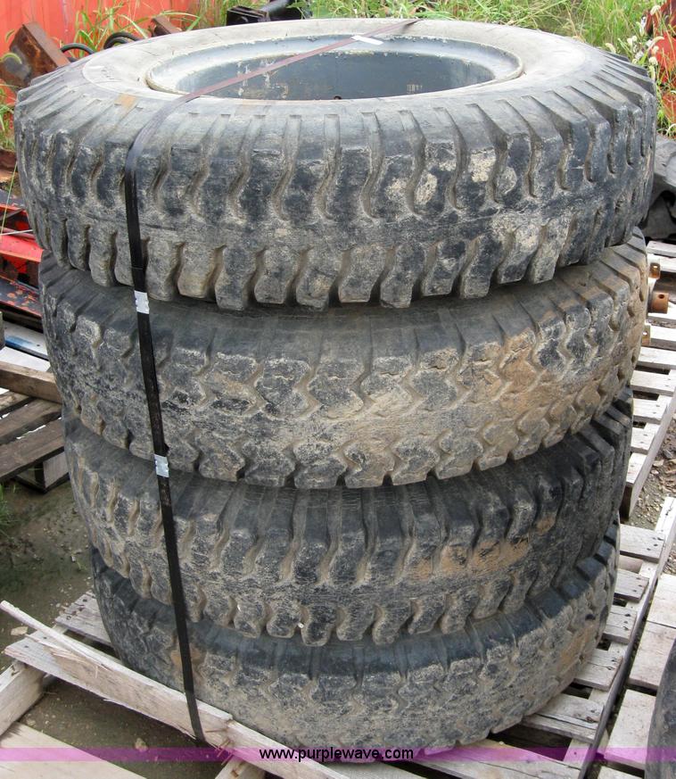 image for item 2553 (8) 9.00-20 rims and tires