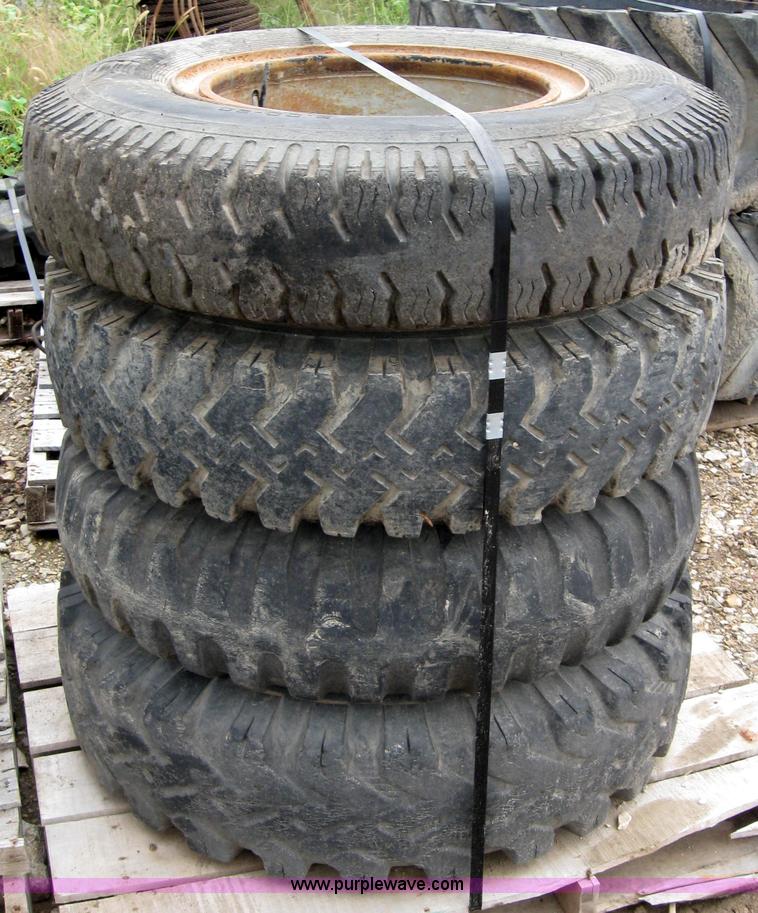 image for item 2553 (8) 9.00-20 rims and tires