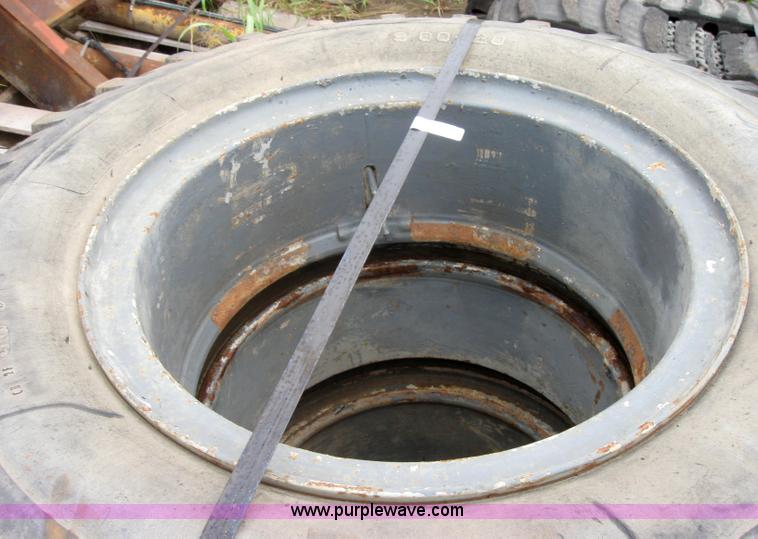 image for item 2553 (8) 9.00-20 rims and tires