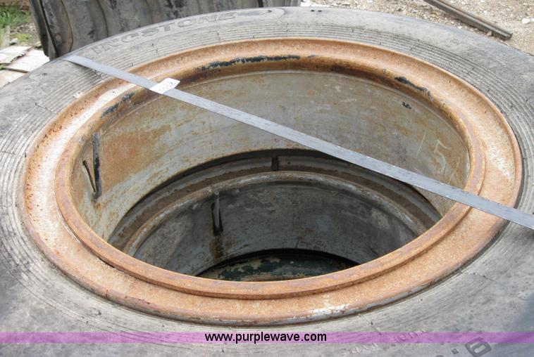 image for item 2553 (8) 9.00-20 rims and tires