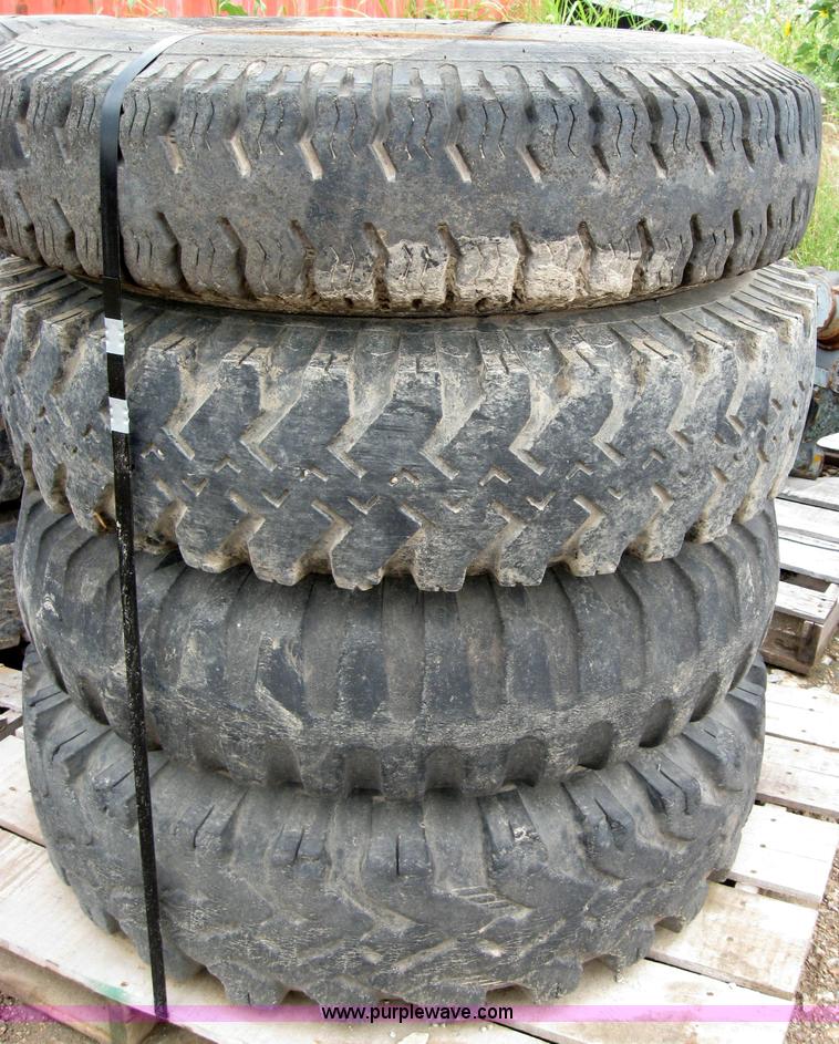 image for item 2553 (8) 9.00-20 rims and tires