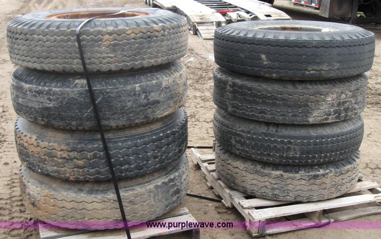 image for item 2554 (8) 10.00-20 rims and tires