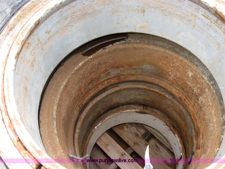 image for item 2554 (8) 10.00-20 rims and tires