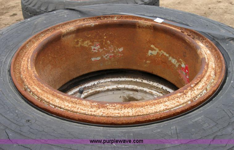 image for item 2554 (8) 10.00-20 rims and tires