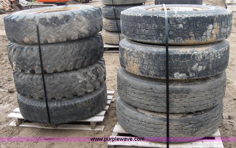 image for item 2555 (8) 10.00-20 rims and tires