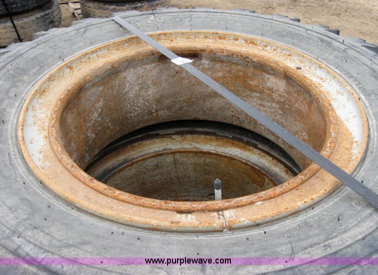 image for item 2555 (8) 10.00-20 rims and tires