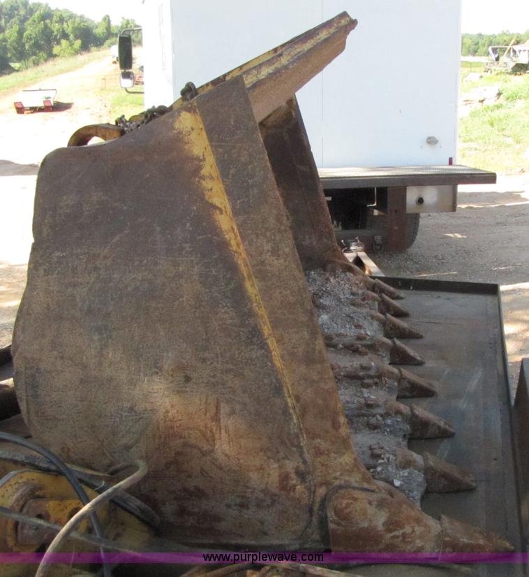 image for item 3128 Balderson quick coupler with bucket and pallet forks