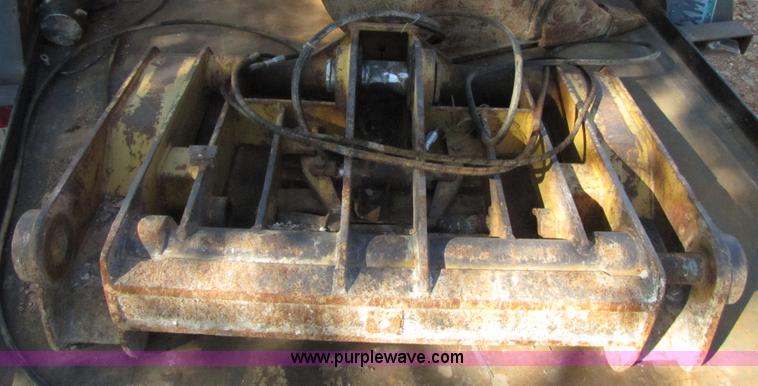 image for item 3128 Balderson quick coupler with bucket and pallet forks