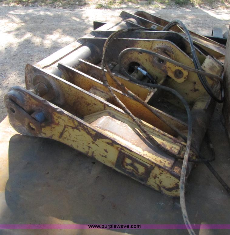 image for item 3128 Balderson quick coupler with bucket and pallet forks