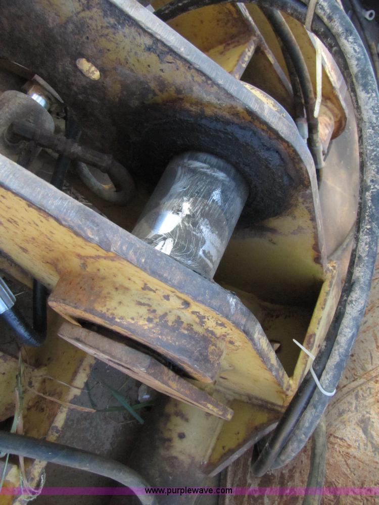 image for item 3128 Balderson quick coupler with bucket and pallet forks