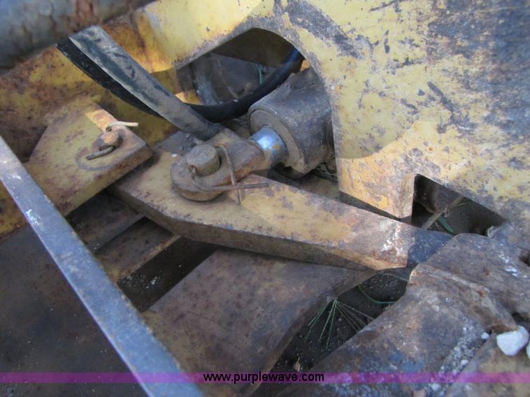 image for item 3128 Balderson quick coupler with bucket and pallet forks