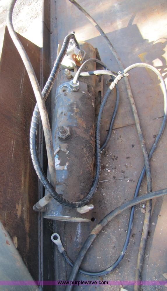 image for item 3128 Balderson quick coupler with bucket and pallet forks