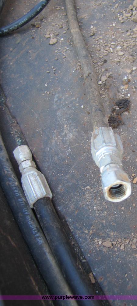 image for item 3128 Balderson quick coupler with bucket and pallet forks