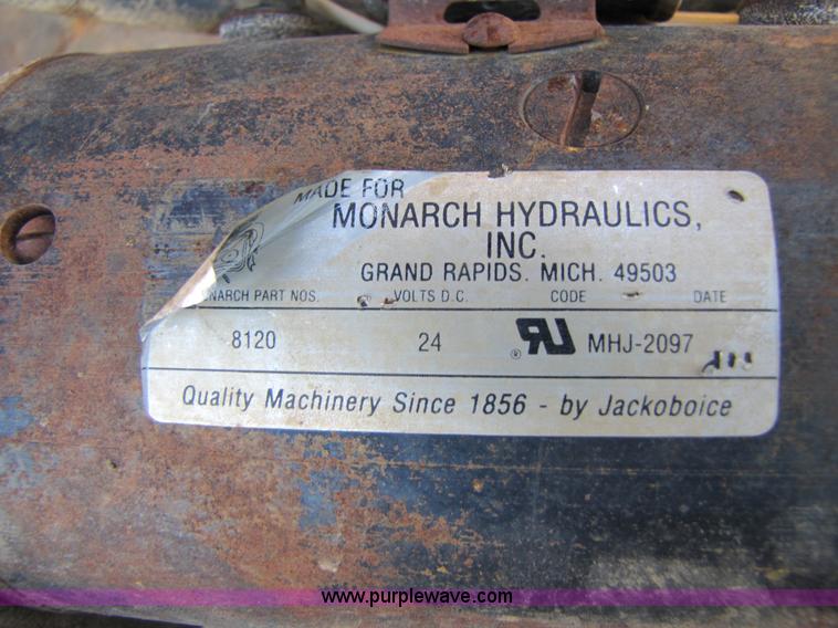 image for item 3128 Balderson quick coupler with bucket and pallet forks