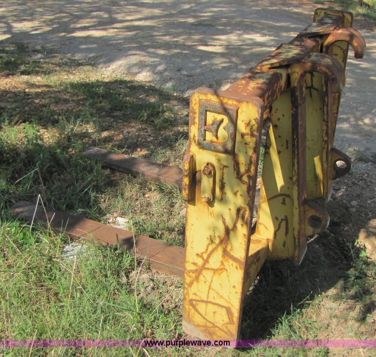 image for item 3128 Balderson quick coupler with bucket and pallet forks