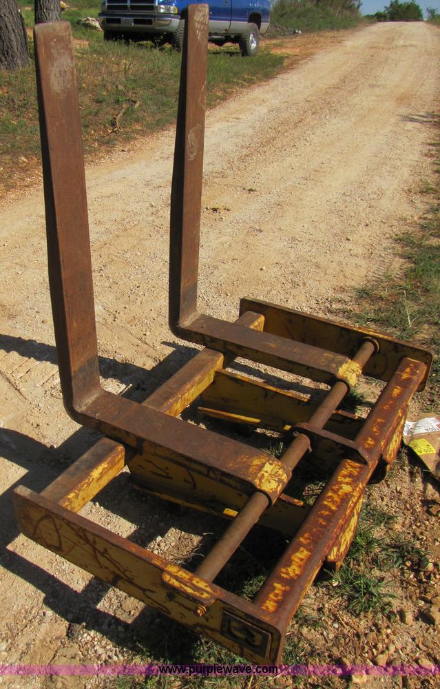 image for item 3128 Balderson quick coupler with bucket and pallet forks