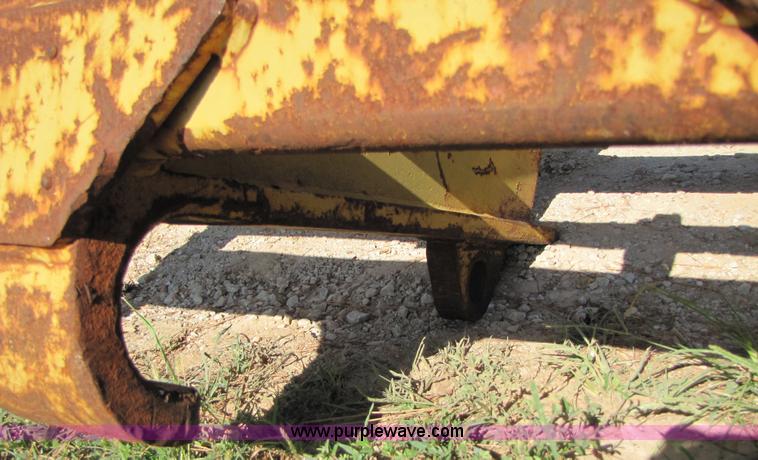image for item 3128 Balderson quick coupler with bucket and pallet forks