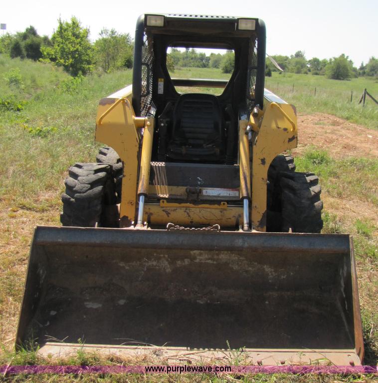image for item 3136 1999 John Deere 250 skid steer