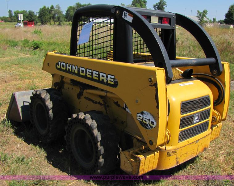 image for item 3136 1999 John Deere 250 skid steer