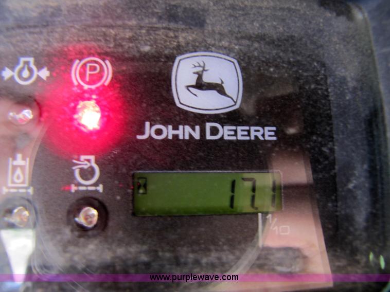 image for item 3136 1999 John Deere 250 skid steer