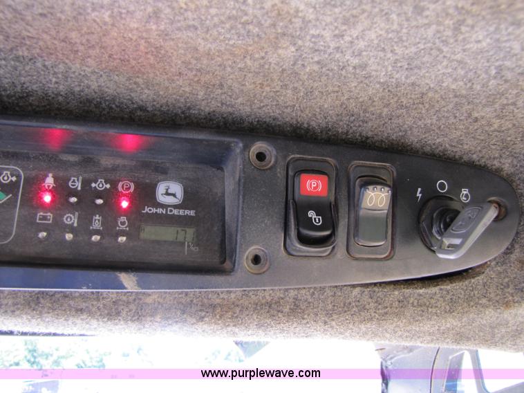 image for item 3136 1999 John Deere 250 skid steer