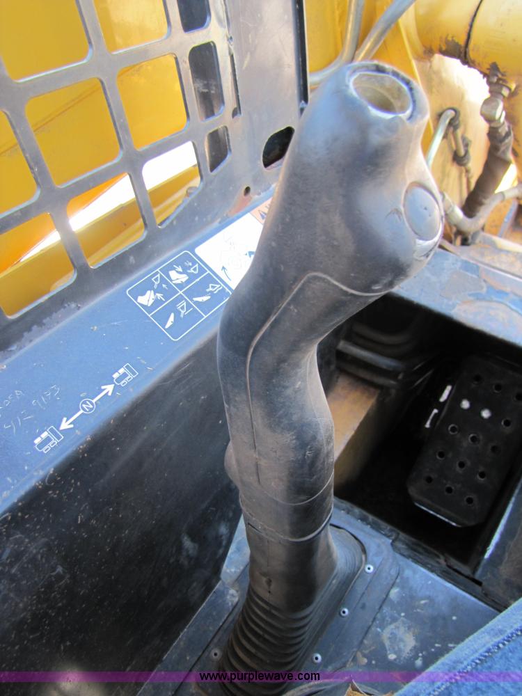 image for item 3136 1999 John Deere 250 skid steer