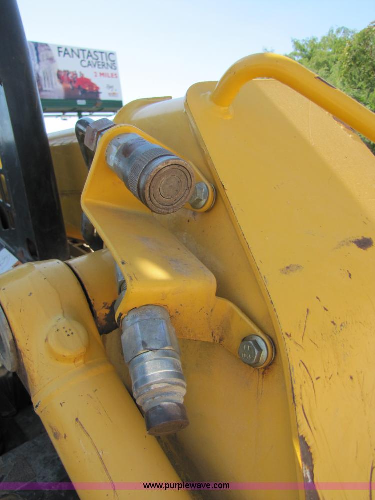 image for item 3136 1999 John Deere 250 skid steer