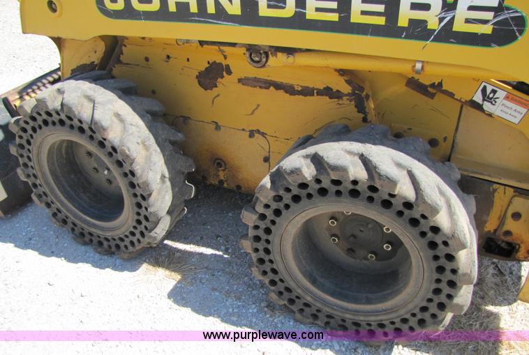 image for item 3136 1999 John Deere 250 skid steer