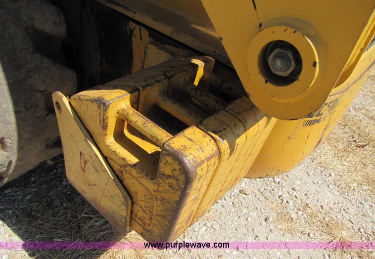 image for item 3136 1999 John Deere 250 skid steer