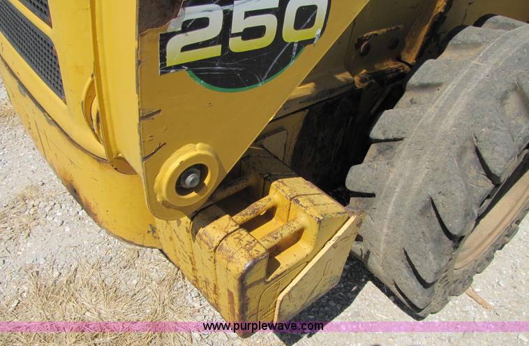 image for item 3136 1999 John Deere 250 skid steer