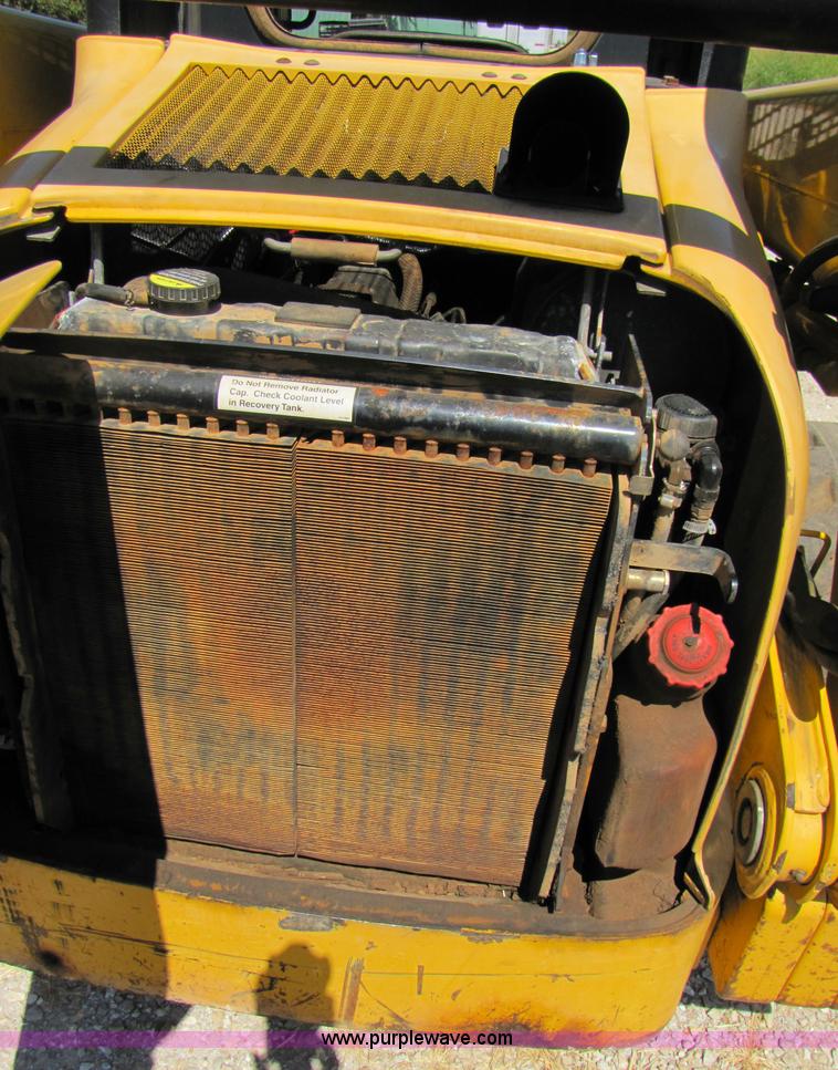 image for item 3136 1999 John Deere 250 skid steer