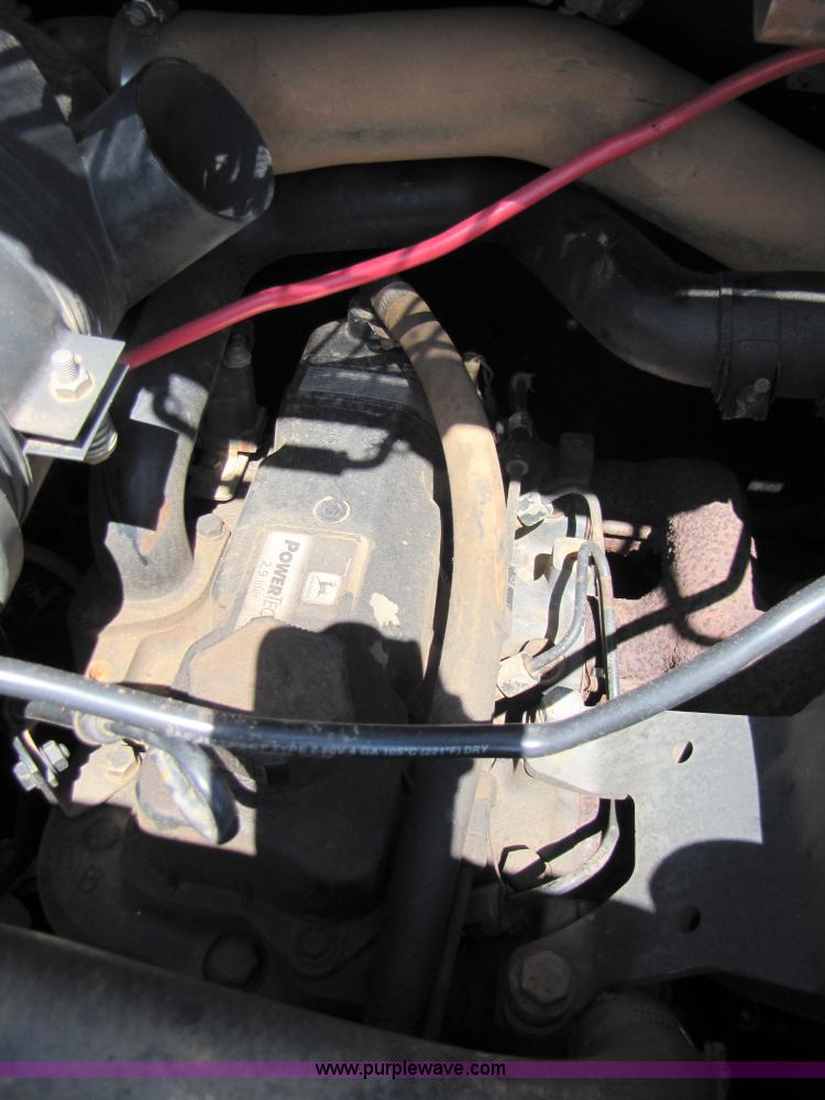 image for item 3136 1999 John Deere 250 skid steer