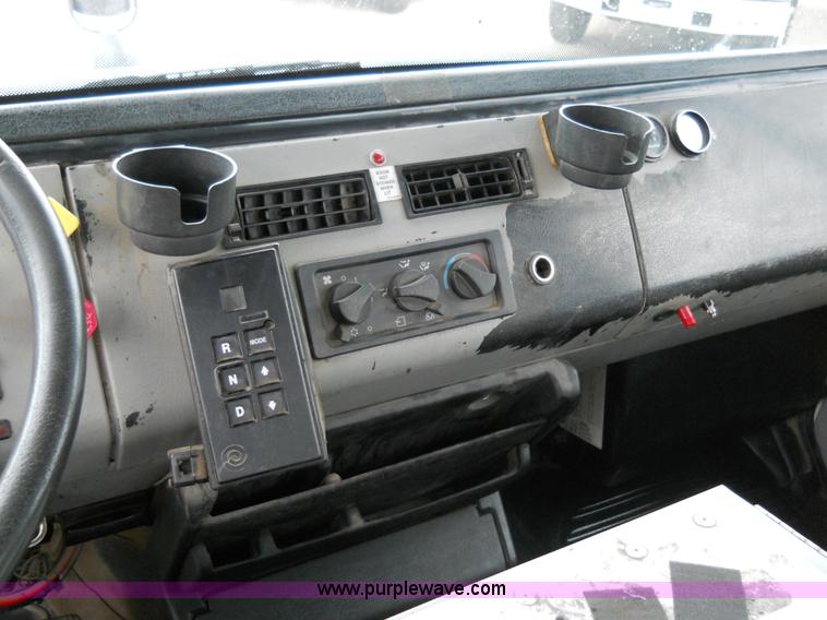 image for item 5059 2001 Freightliner FL80 digger truck