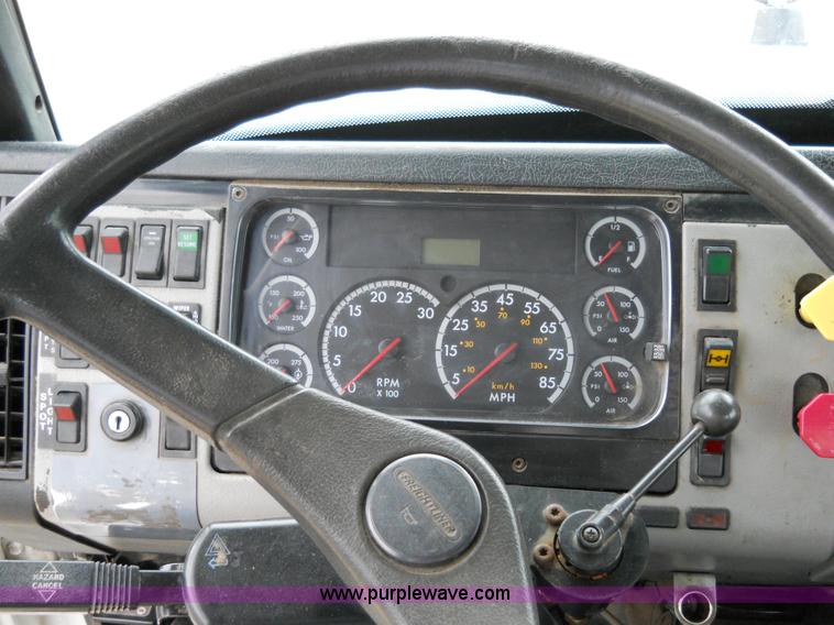 image for item 5059 2001 Freightliner FL80 digger truck