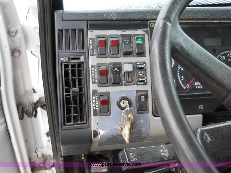 image for item 5059 2001 Freightliner FL80 digger truck