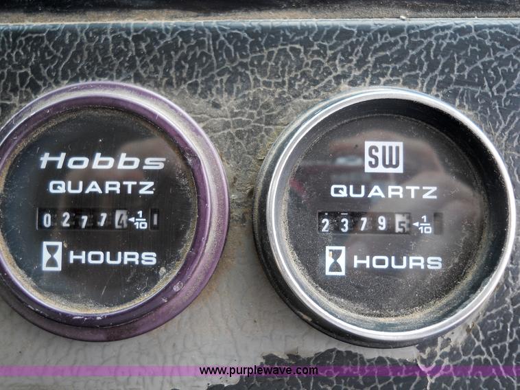 image for item 5059 2001 Freightliner FL80 digger truck