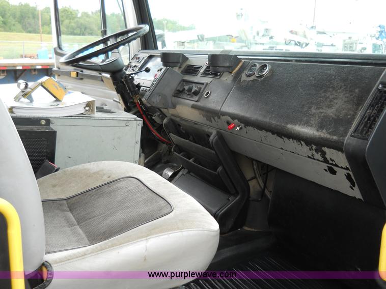 image for item 5059 2001 Freightliner FL80 digger truck