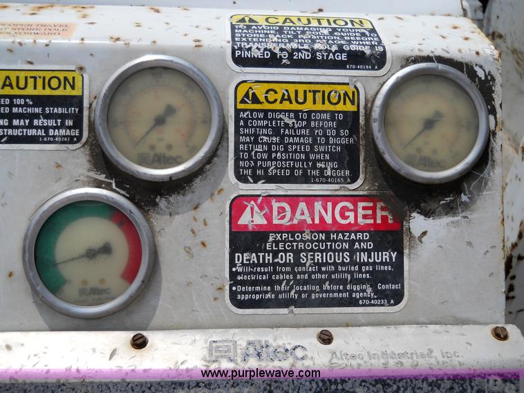 image for item 5059 2001 Freightliner FL80 digger truck